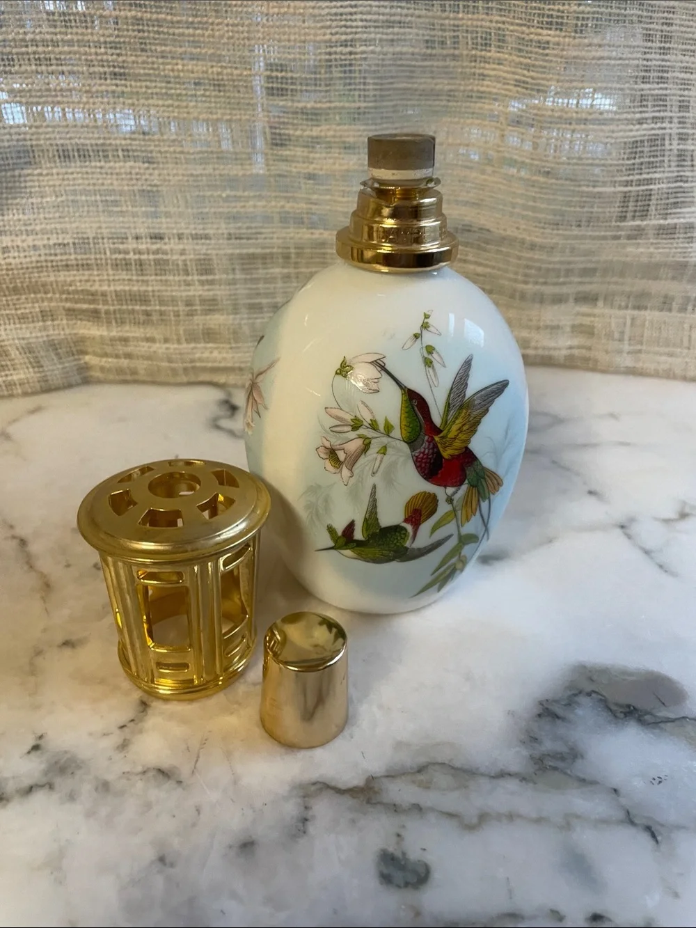 a vintage Lampe Berger Limoges Porcelain Hummingbird Fragrance Lamp